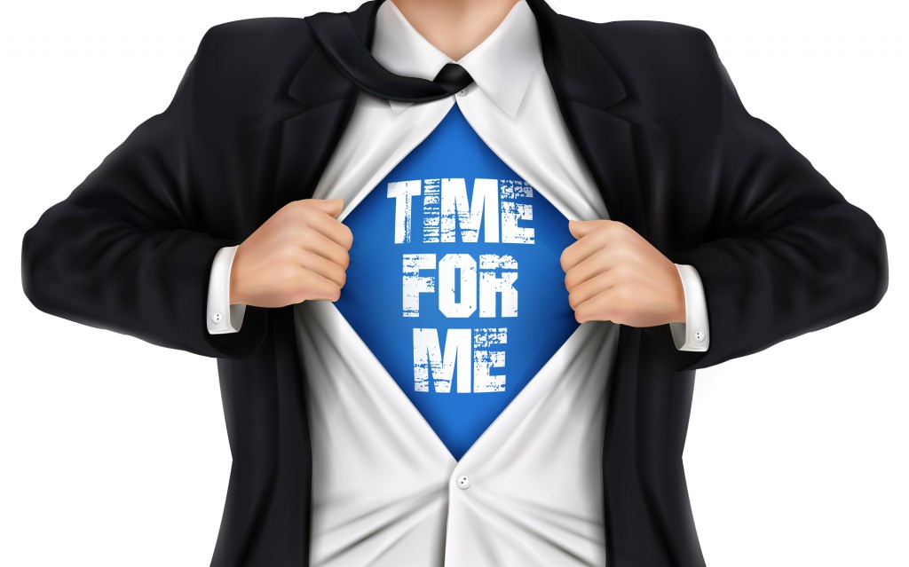 businessman showing Time for me words underneath his shirt over white background