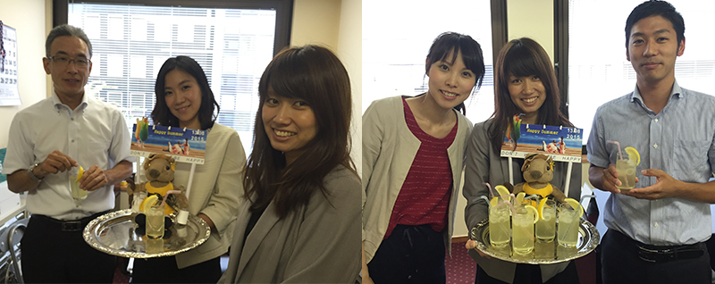 nikko-shoken-team-handing-out-drinks