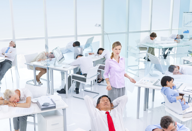 Group of Business People Sleeping in the Office